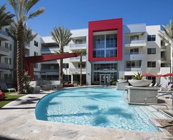 Relaxing resort-style pool with sundeck and spa